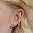 Model Wearing Crystal and Opal Crescent Moon Stud Earrings in Gold