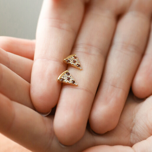 Model Holding Earrings Model Holding Crystal Pizza Stud Earrings in Gold Between Fingers