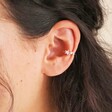 Close Up of Crystal Star Ear Cuff in Silver on Model