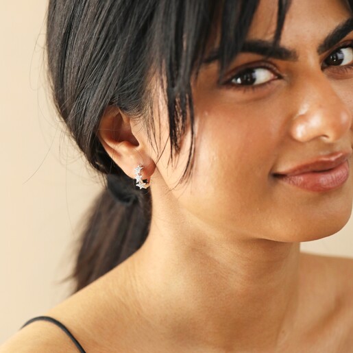 Crystal Triple Star Huggie Hoop Earrings in Gold on Model