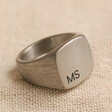 Men's Personalised Brushed Stainless Steel Signet Ring on Beige Fabric