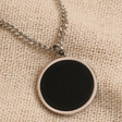 Men's Personalised Stainless Steel Black Onyx Stone Pendant Necklace on Beige Fabric