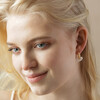 Pearl Resin Heart Huggie Hoop Earrings in Gold on Model