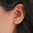Close Up of Pink Opal Flower Stud Earrings in Silver on Model