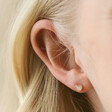 Close Up of Rose Quartz Heart Stud Earrings in Gold on Model