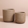 Garden Trading Set of 2 Warm Stone Stratton Straight Planter next to each other against neutral background
