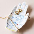 Palm Reading Trinket Dish with Jewellery Inside on Beige Coloured Background