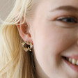 Close Up of Model Wearing Crystal Flower and Enamel Bee Stud Earrings in Gold