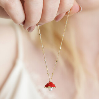 Pearl and Enamel Toadstool Charm Bracelet in Gold