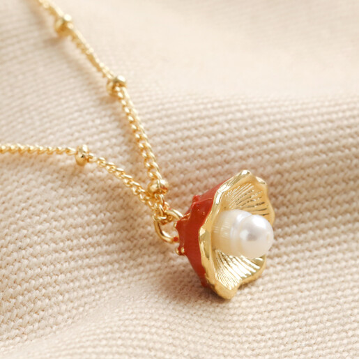 Close Up of Charm on Pearl and Enamel Toadstool Charm Bracelet in Gold