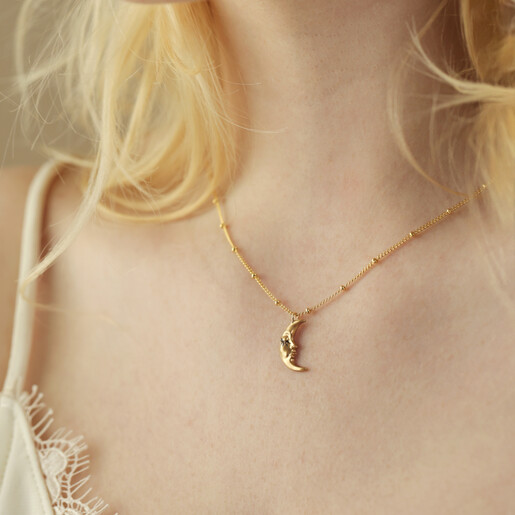 Model Wearing Sleeping Moon Pendant Necklace in Gold
