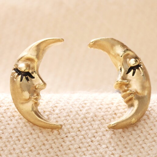 Sleeping Moon Stud Earrings in Gold on Neutral Fabric
