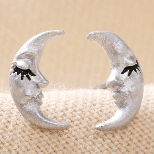 Sleeping Moon Stud Earrings in Silver on Neutral Fabric