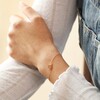 Triple Enamel Flower Chain Bracelet in Gold on Model with Hand on Arm