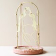 Feminine Figure Jewellery Stand with Terrazzo Base on Beige Surface against Light Pink Background