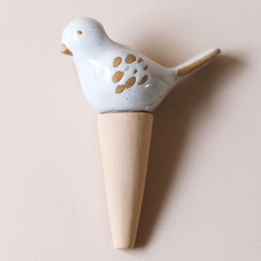 Ceramic Bird Plant Watering Spike on Neutral Background