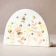 Dusky Pink Floral Ceramic Earring Holder with Neutral Background
