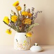 Dusky Pink Floral Bee Ceramic Jar Arranged with Bright Yellow Flowers Inside