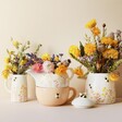 Dusky Pink Ceramics Set with Dusky Pink Floral Bee Ceramic Teapot and Mug Set Arranged with Flowers