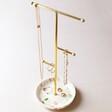Floral Figures Jewellery Stand with Jewellery on with Neutral Background