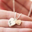 Model Holding Valentine's Day Personalised Double Heart Charm Necklace