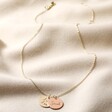 Lisa Angel Ladies' Engraved Personalised Mixed Metal Disc Charm Necklace Full Length on Beige Fabric
