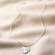 Personalised Sterling Silver Family Necklace Full Length on Beige Fabric