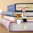 Hand-Stamped Personalised Charm and Ribbon Bookmarks in Pages of Books
