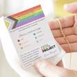 Model Holding Personalised Pride Take What You Need Crystal Bracelet and jewellery card