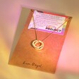 Gold Personalised Rainbow Pride Eternity Pendant Necklace on jewellery card packaging