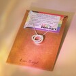 Silver hand-stamped Personalised Rainbow Pride Eternity Pendant Necklace on jewellery card