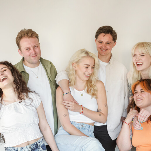 Rainbow Pride Eternity Pendant Necklace in Gold on model in group shot