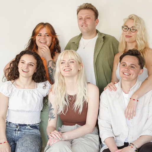 Rainbow Pride Eternity Pendant Necklace in Silver on model in group shot