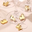 Gold Set of 6 Dog Wine Glass Charms Mixed Together on Base of Wine Glasses