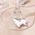 Close Up of Silver Spaniel Charm from Set of 6 Dog Wine Glass Charms on Base of Wine Glasses