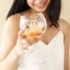 Model Holding Floral Bumblebee Gin Glass