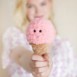 Model holding Jellycat Irresistible Ice Cream Strawberry Soft Toy in front 
