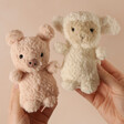 Models Holding Jellycat Wee Lamb and Wee Pig Soft Toys