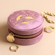 Moon and Sun Mauve Pink Velvet Round Travel Jewellery Case Surrounded by Gold Jewellery