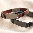 Men's Double Leather Bracelets in Black and Brown on Beige Fabric