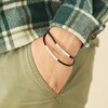 Model Wearing Men's Double Wrap Thin Leather Bracelet in Brown with Hand in pocket