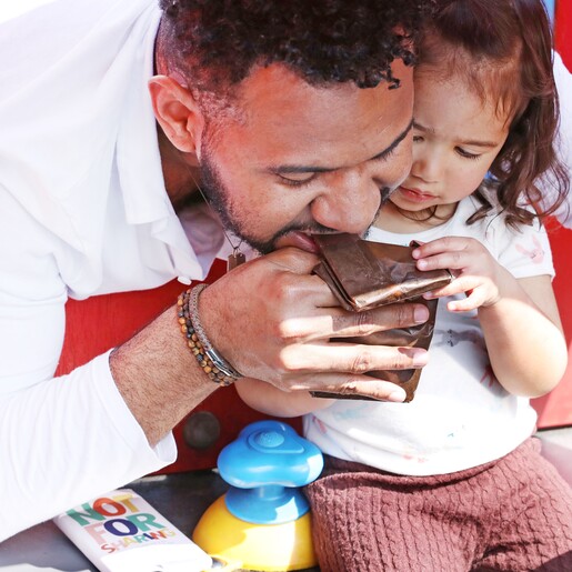 Dad Eating Chocolate with Daughter Whilst Wearing Men's Personalised Antiqued Leather Bracelet