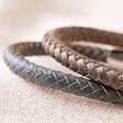 Men's Personalised Antiqued Leather Bracelet in brown and navy stacked on top of each other