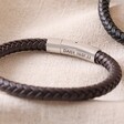 Brown Men's Personalised Leather Bracelet on beige fabric