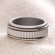 Men's Stainless Steel Spinning Band Ring on Neutral Coloured Fabric