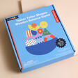 Personalised Shapes Wooden Balance Game packaging on neutral background