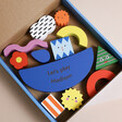 Box open showing contents inside Personalised Shapes Wooden Balance Game