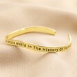 Adjustable 'Favourite Person' Meaningful Word Wave Bangle in Gold on neutral coloured fabric