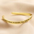 Adjustable 'Sisters' Meaningful Word Wave Bangle in Gold on neutral coloured fabric