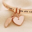 Close Up of Rose Gold 'Never Forgotten' Meaningful Word Bangle in Rose Gold